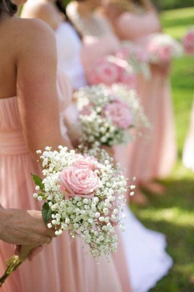 These bridesmaids bouquets are simple but, beautiful. They include babies breath and pink roses